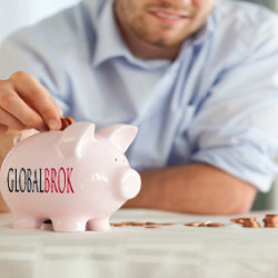 Change being put into piggy bank